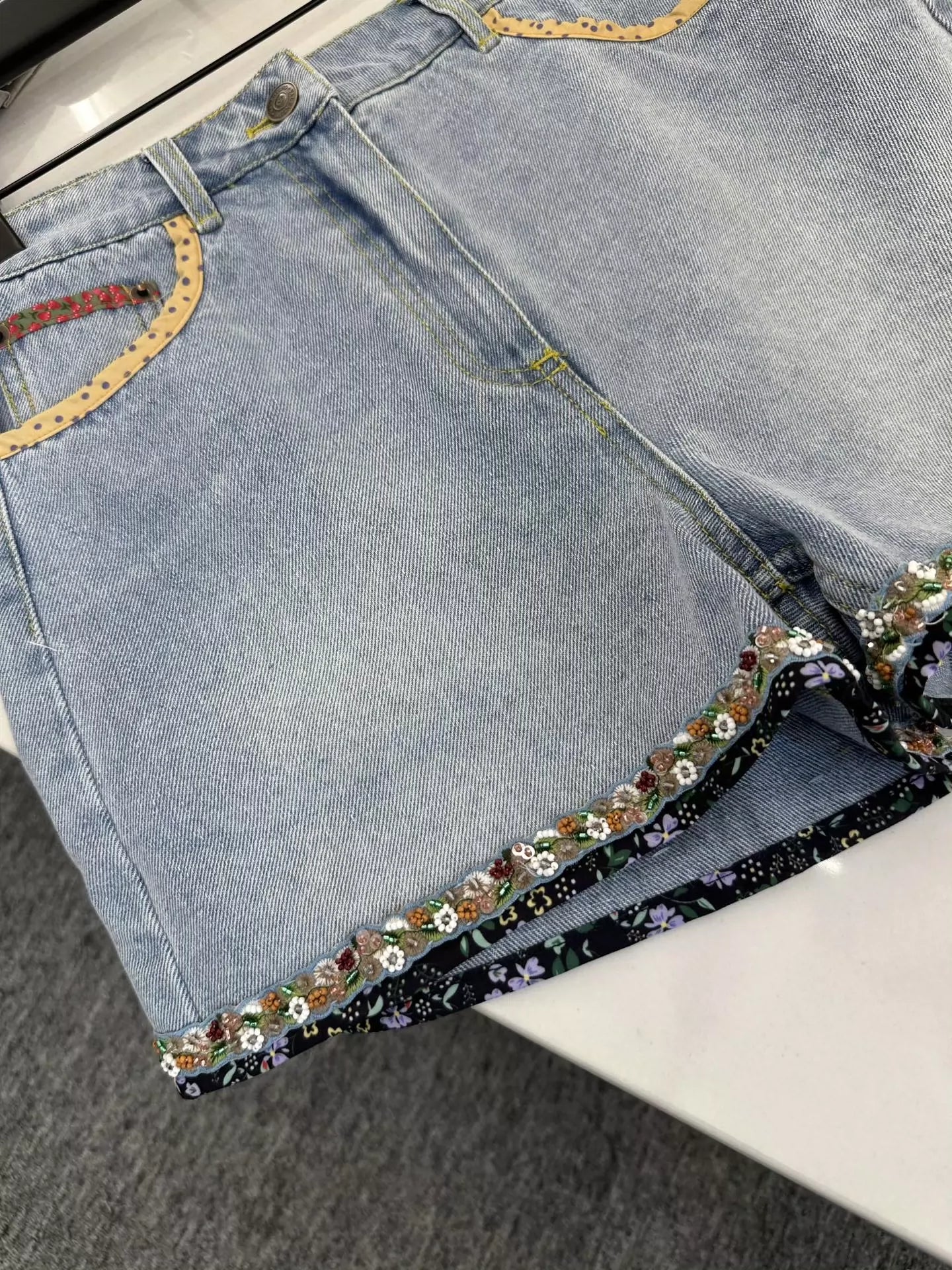 V 25 Floral beaded shorts