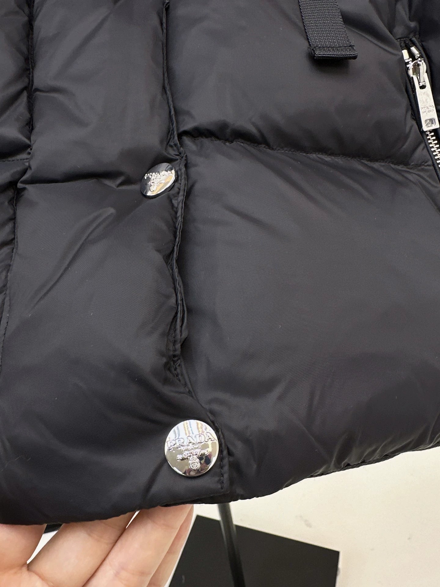 P 25fw hooded turtleneck down vest