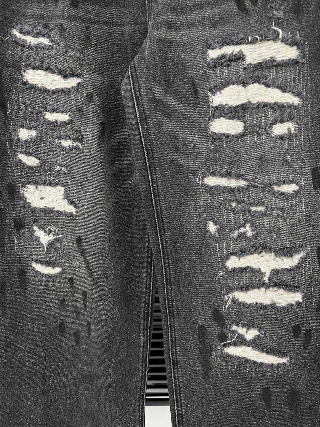 D 25 Ripped ink-splashed black and grey trousers Jeans
