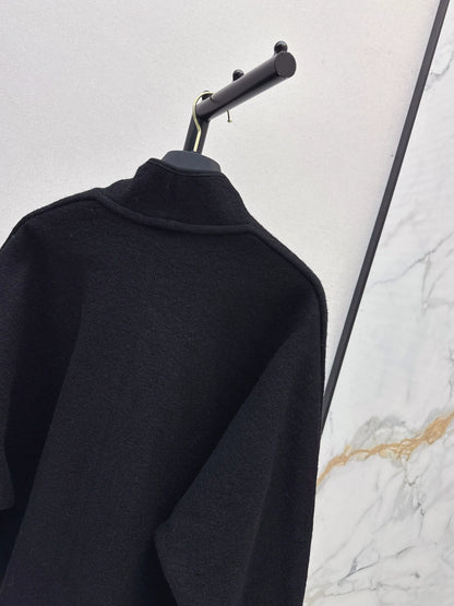L 25 Buckled double-sided cape coat