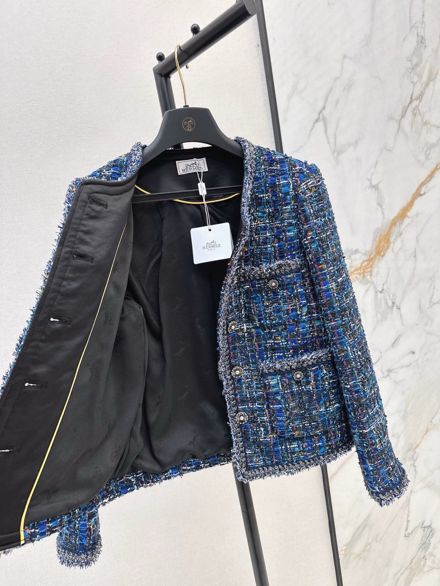 He 25 Tweed jacket with trim