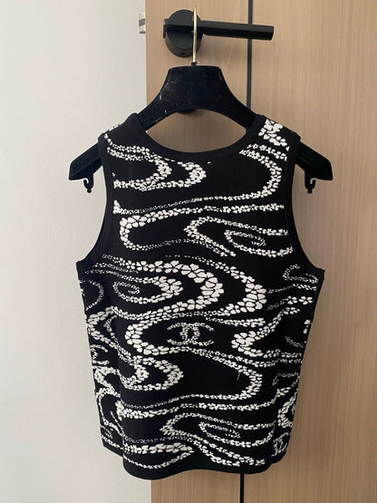 Gilet tricoté sans manches à col rond et motif pétale C 25 