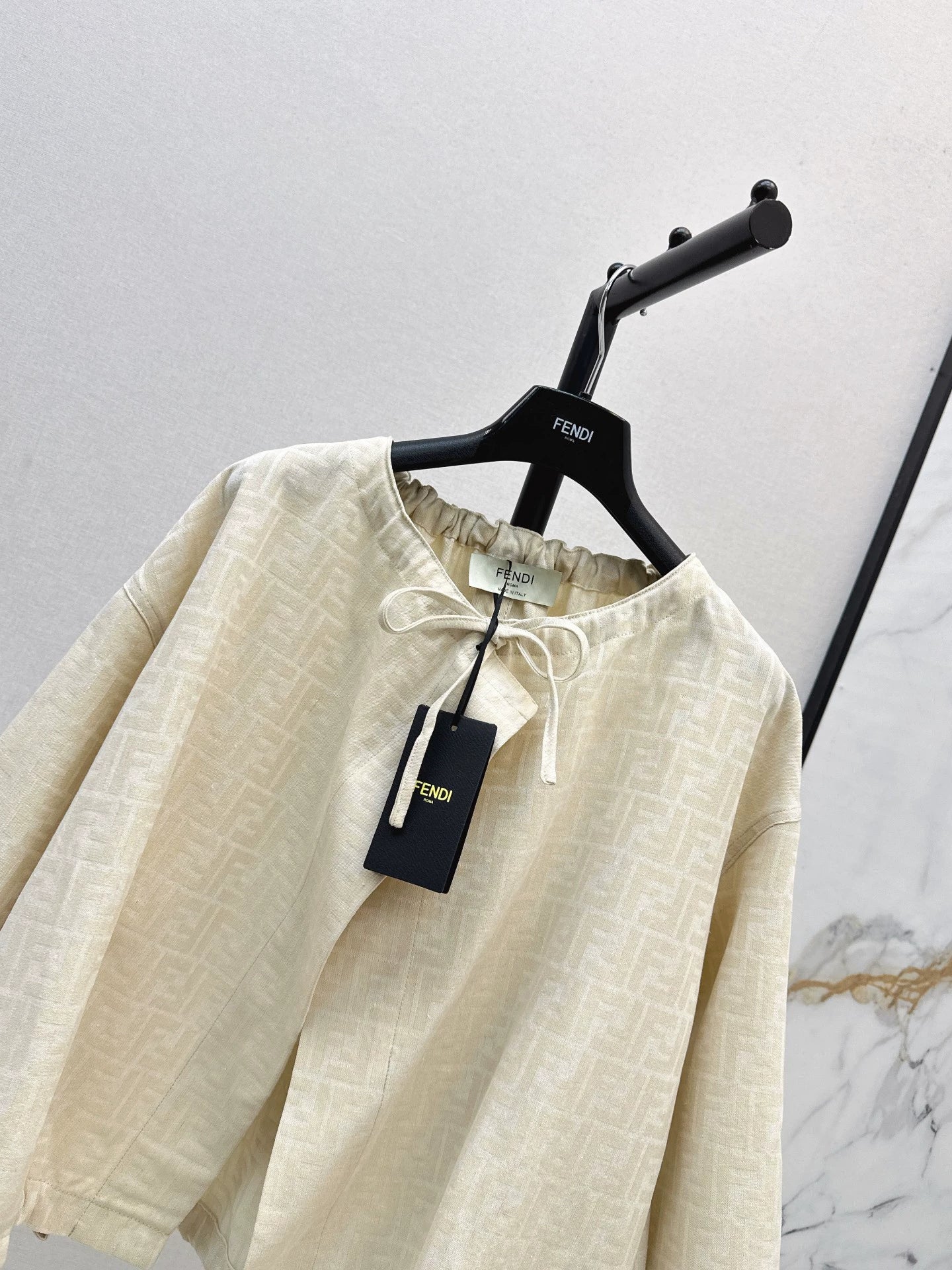 Fe 25 letter print cape coat