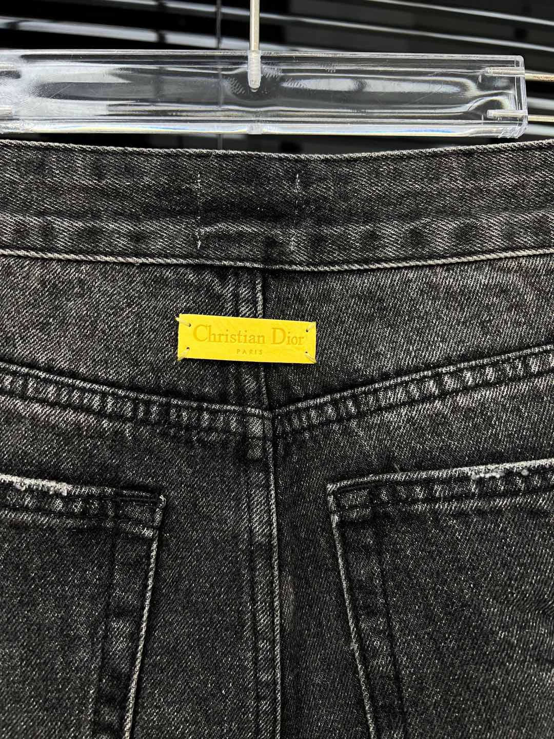 D 25 Ripped ink-splashed black and grey trousers Jeans