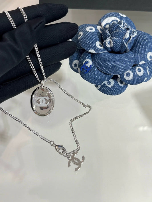 C 25 White Enamel Double C Mirrored Oval Button Necklace