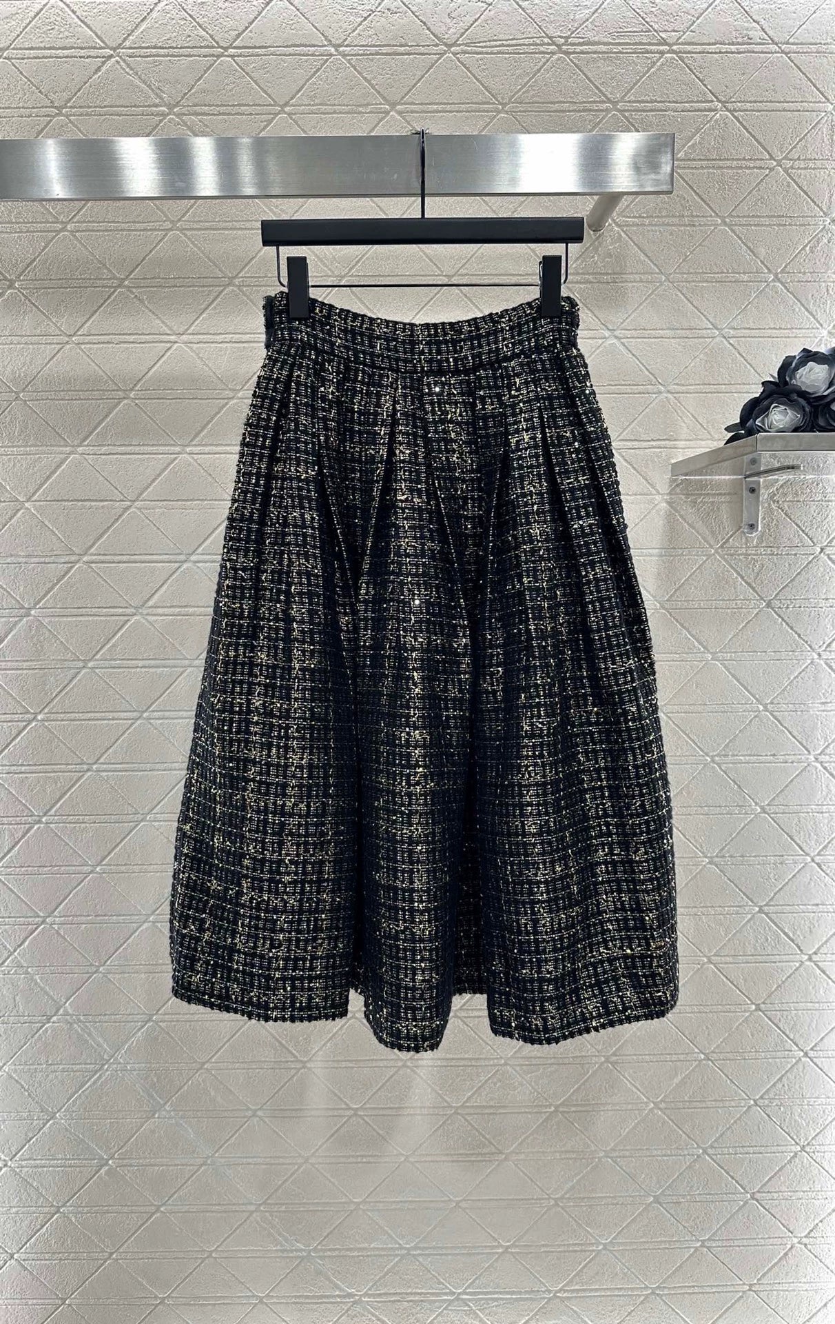C 25 Round-neck dress and skirt set with beaded hem.