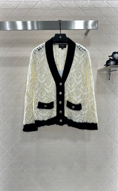 C 25 Contrast-color crochet cardigan.