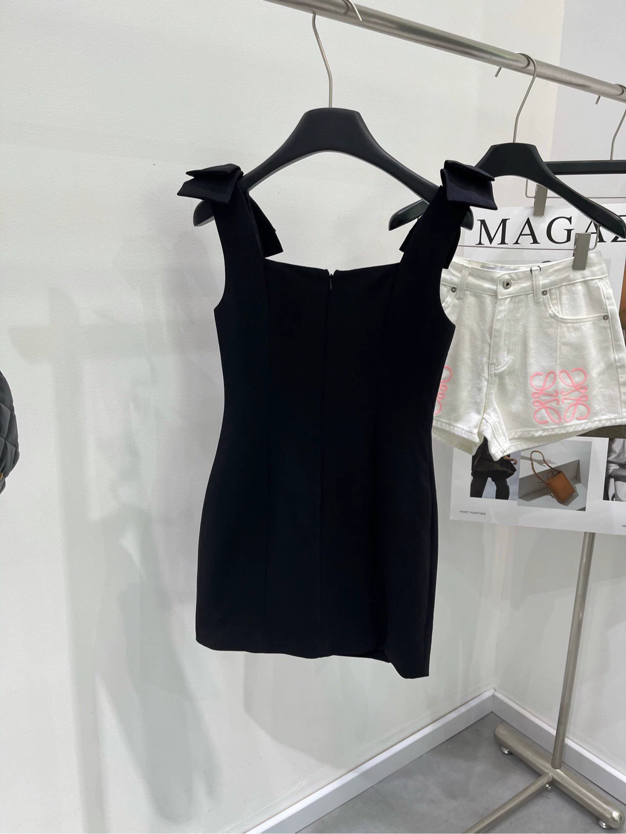 C 25 Shoulder bow black skirt