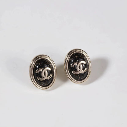 C 25 Gold Oval Black Double C Stud Earrings