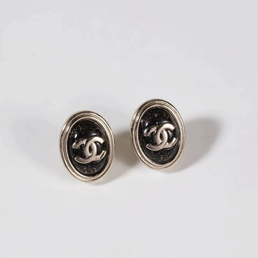 C 25 Gold Oval Black Double C Stud Earrings