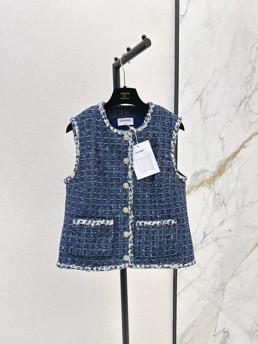 C 25 Model's sapphire blue tweed vest