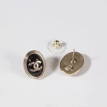 C 25 Gold Oval Black Double C Stud Earrings