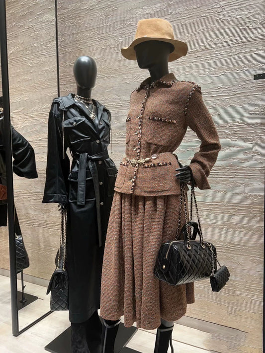 C 25 new styles featuring a lapel dress with beaded hem and skirt set.