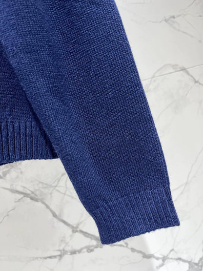 D 25 New letter-print cashmere and wool sweater.