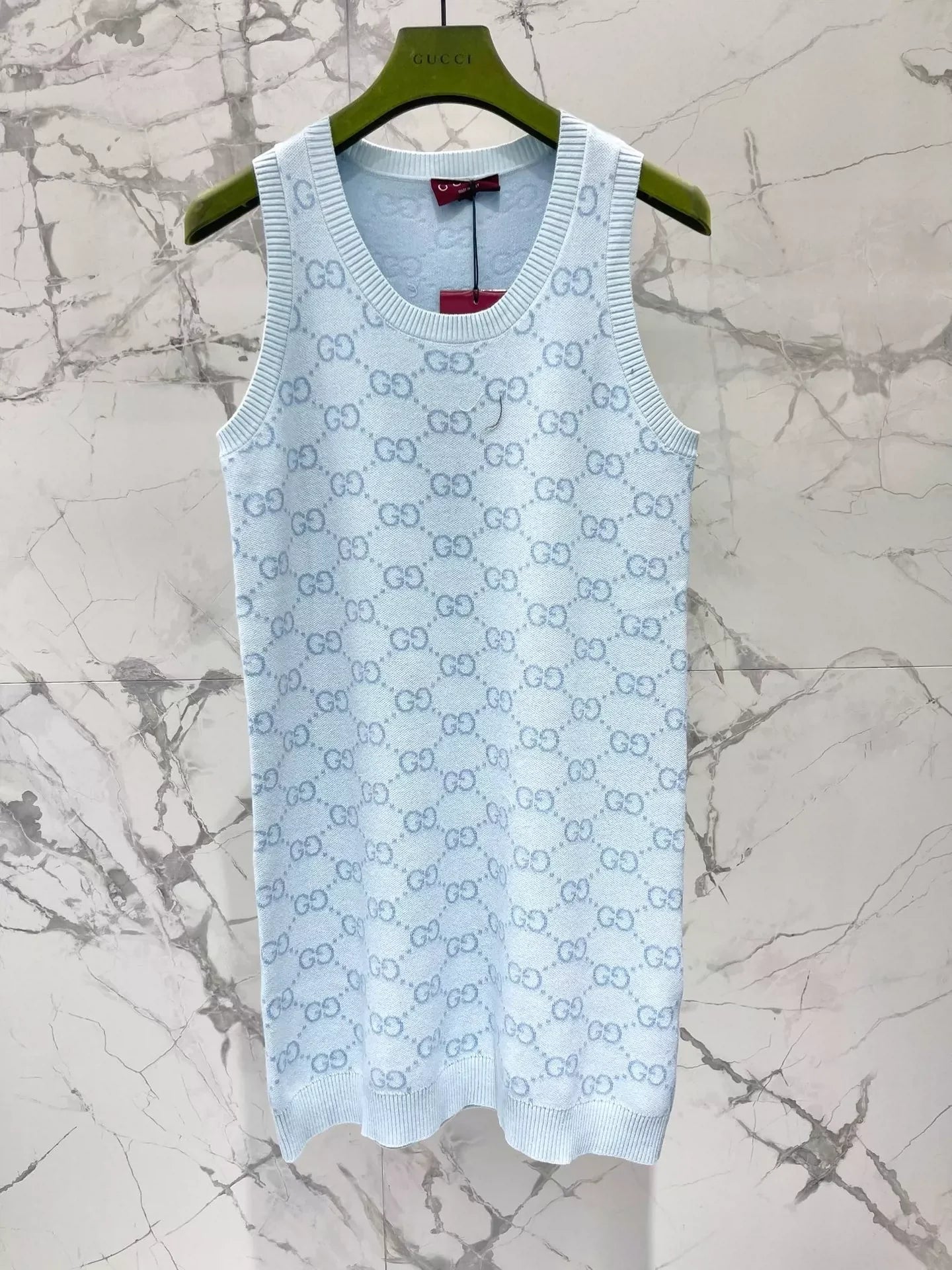 G 25 Sleeveless knit dress with dark pattern