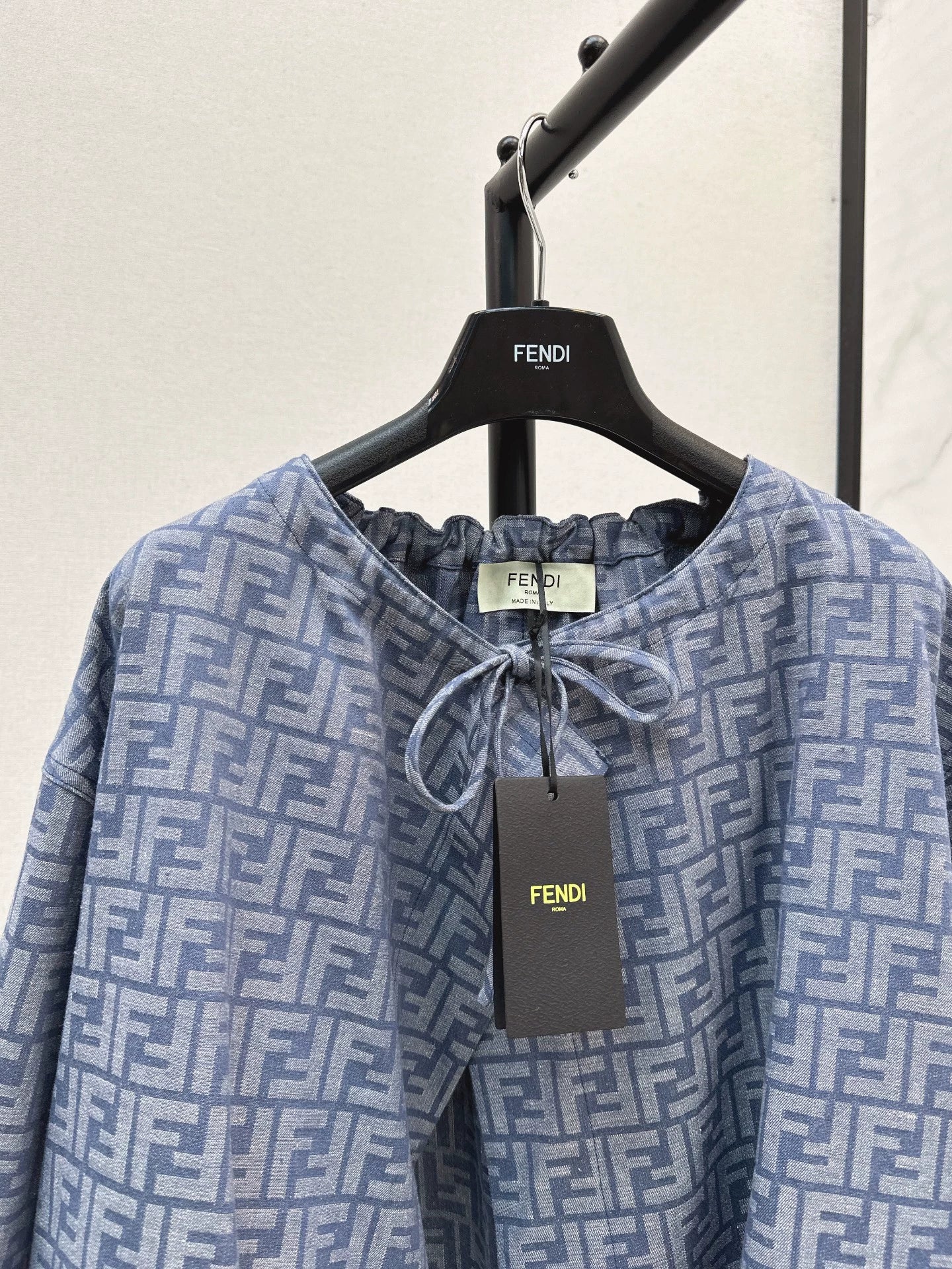 Fe 25 letter print cape coat