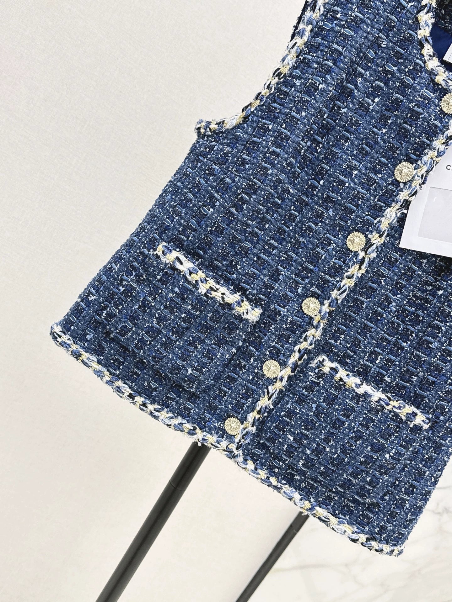 C 25 Model's sapphire blue tweed vest