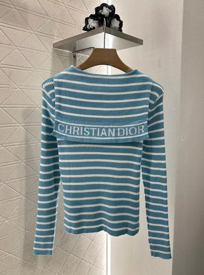 D Spring/Summer 25 Shawl-neck striped knit long-sleeve top.