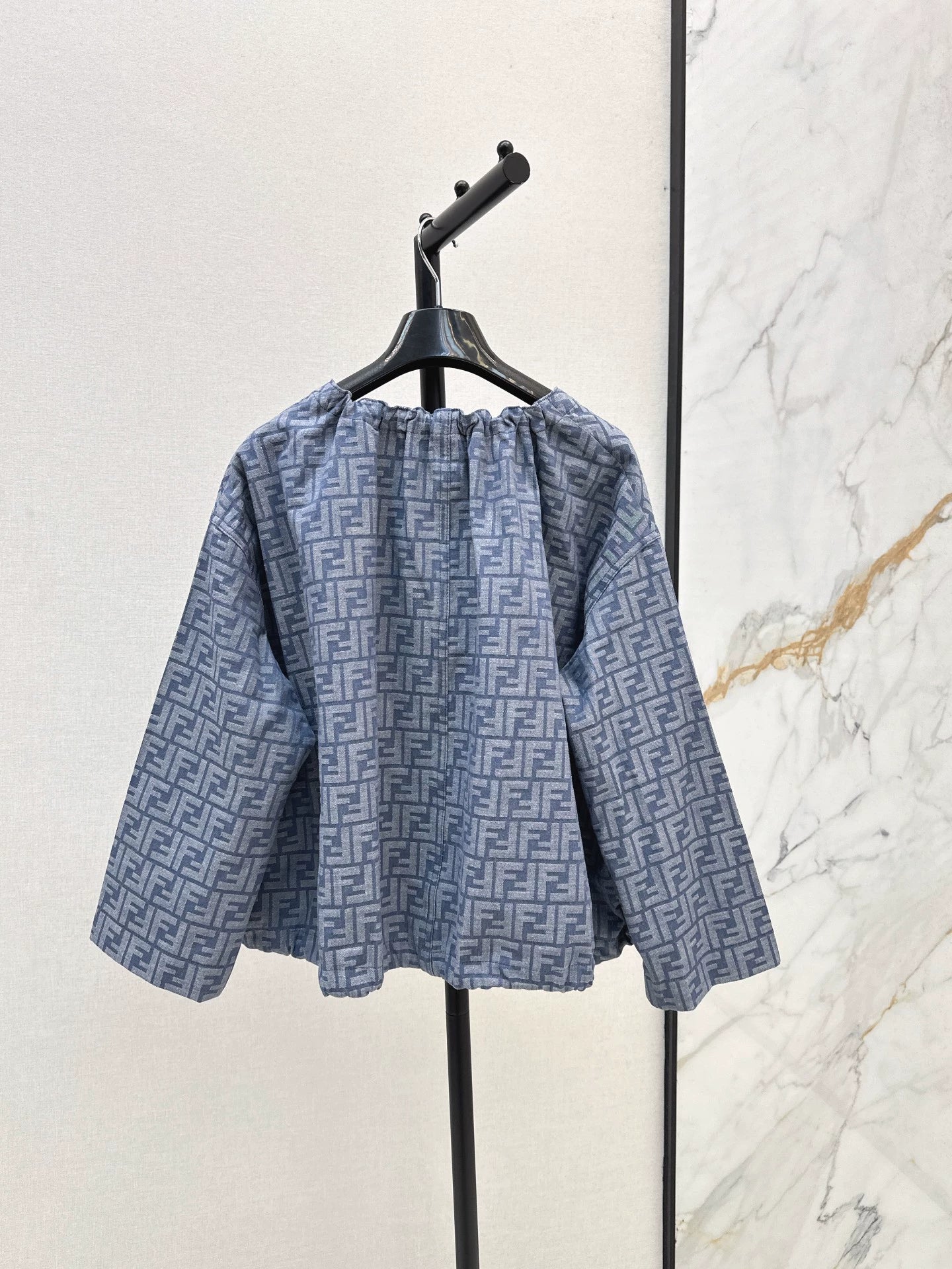 Fe 25 letter print cape coat