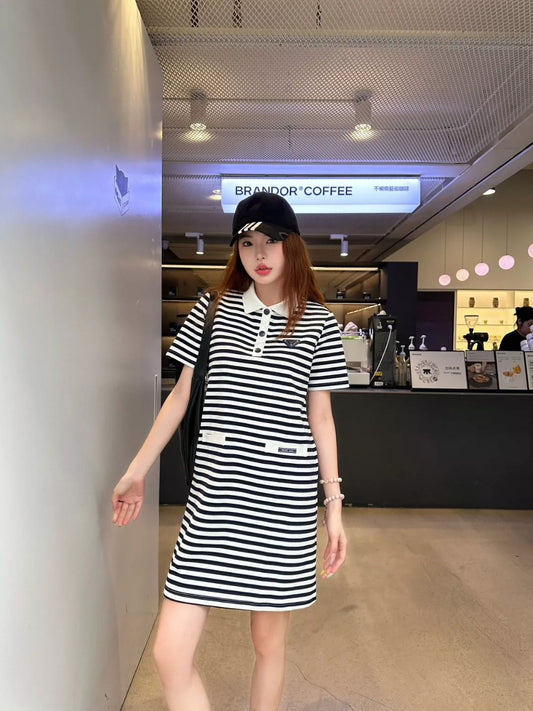 p Spring/Summer 25 Striped short-sleeved dress.