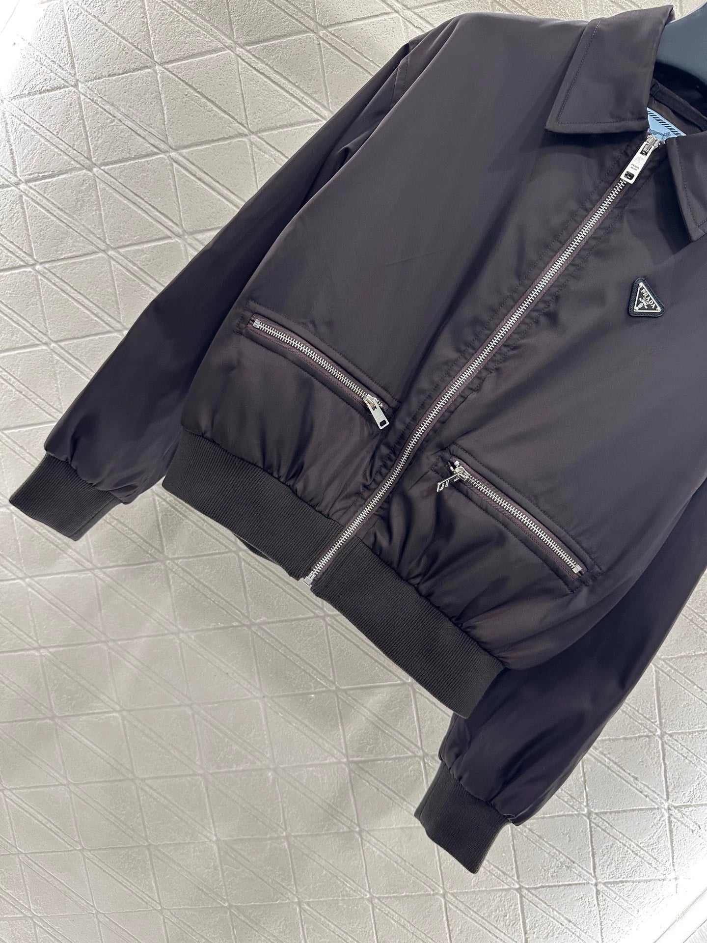 P 25 Zippered padded jacket