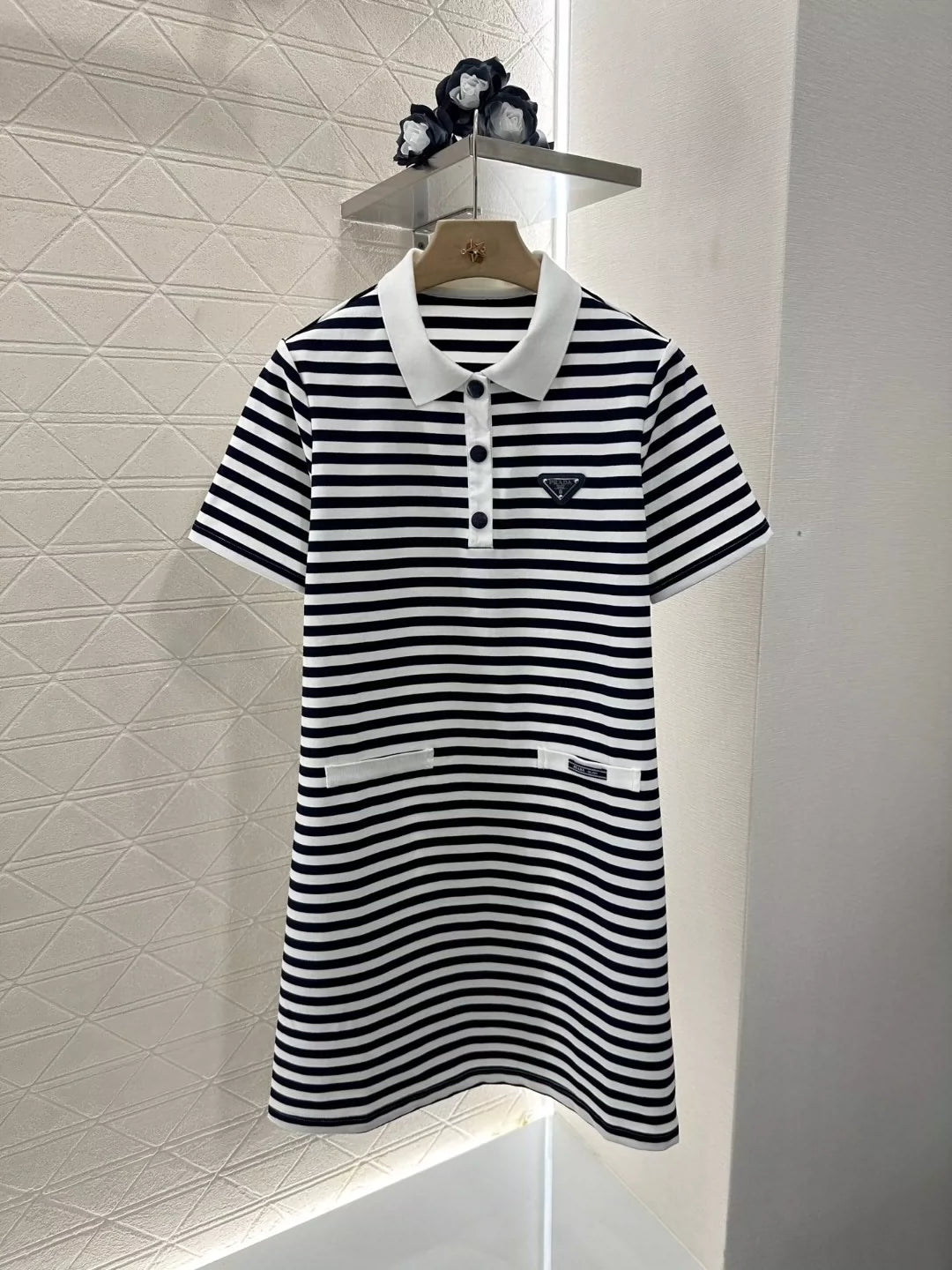 p Spring/Summer 25 Striped short-sleeved dress.
