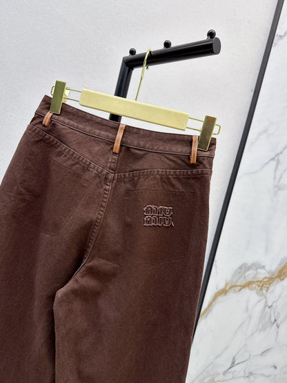 M 25 Brown jeans with leather detailing