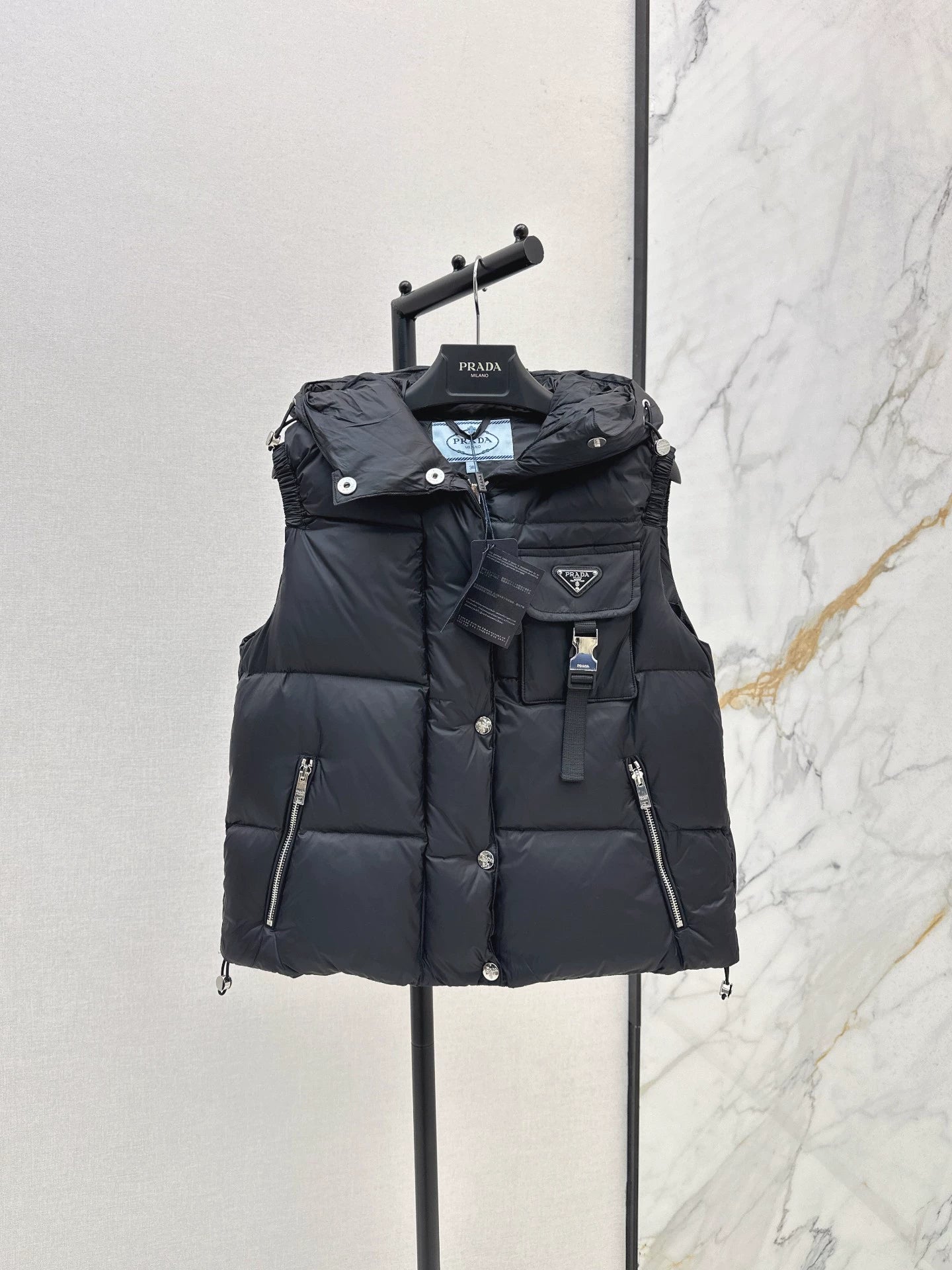 P 25fw hooded turtleneck down vest