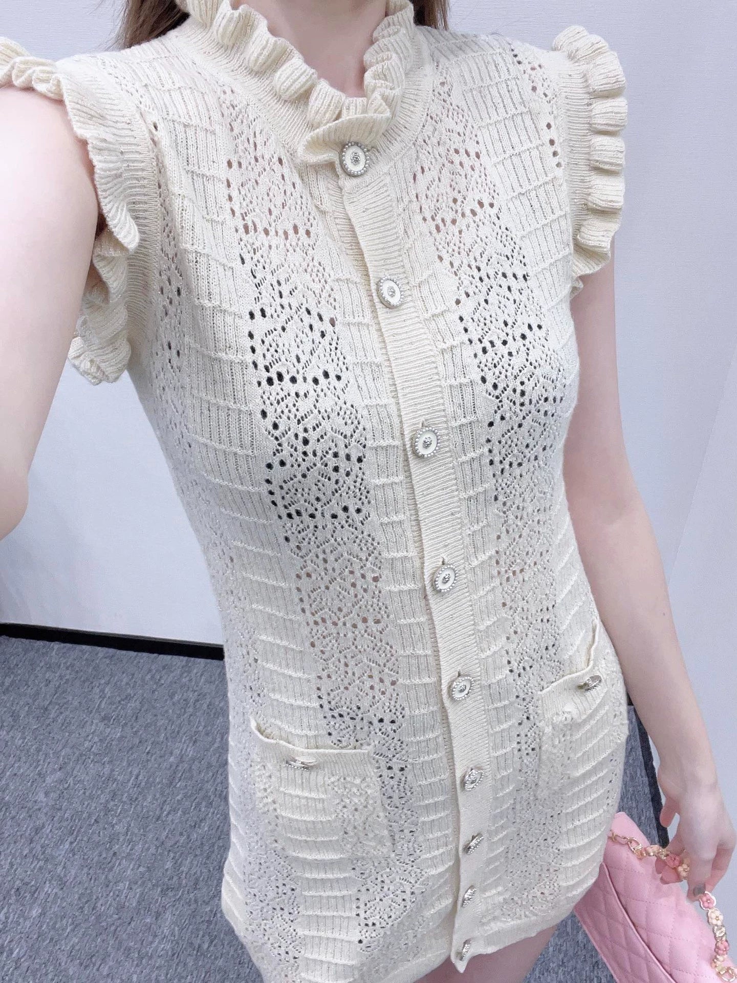 Knitted vest skirt with quilted sleeves