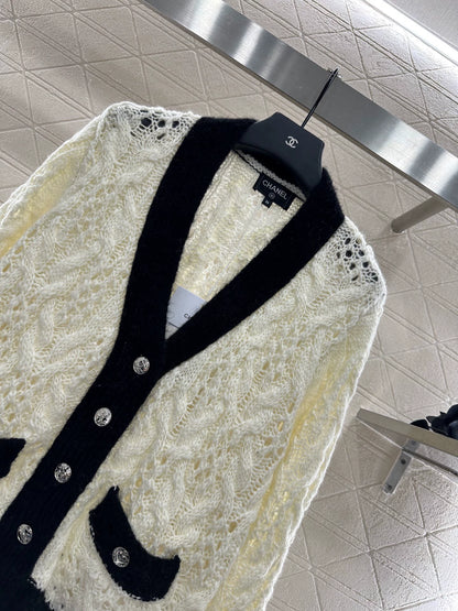 C 25 Contrast-color crochet cardigan.