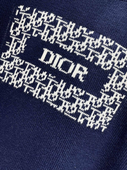D 25 New letter-print cashmere and wool sweater.