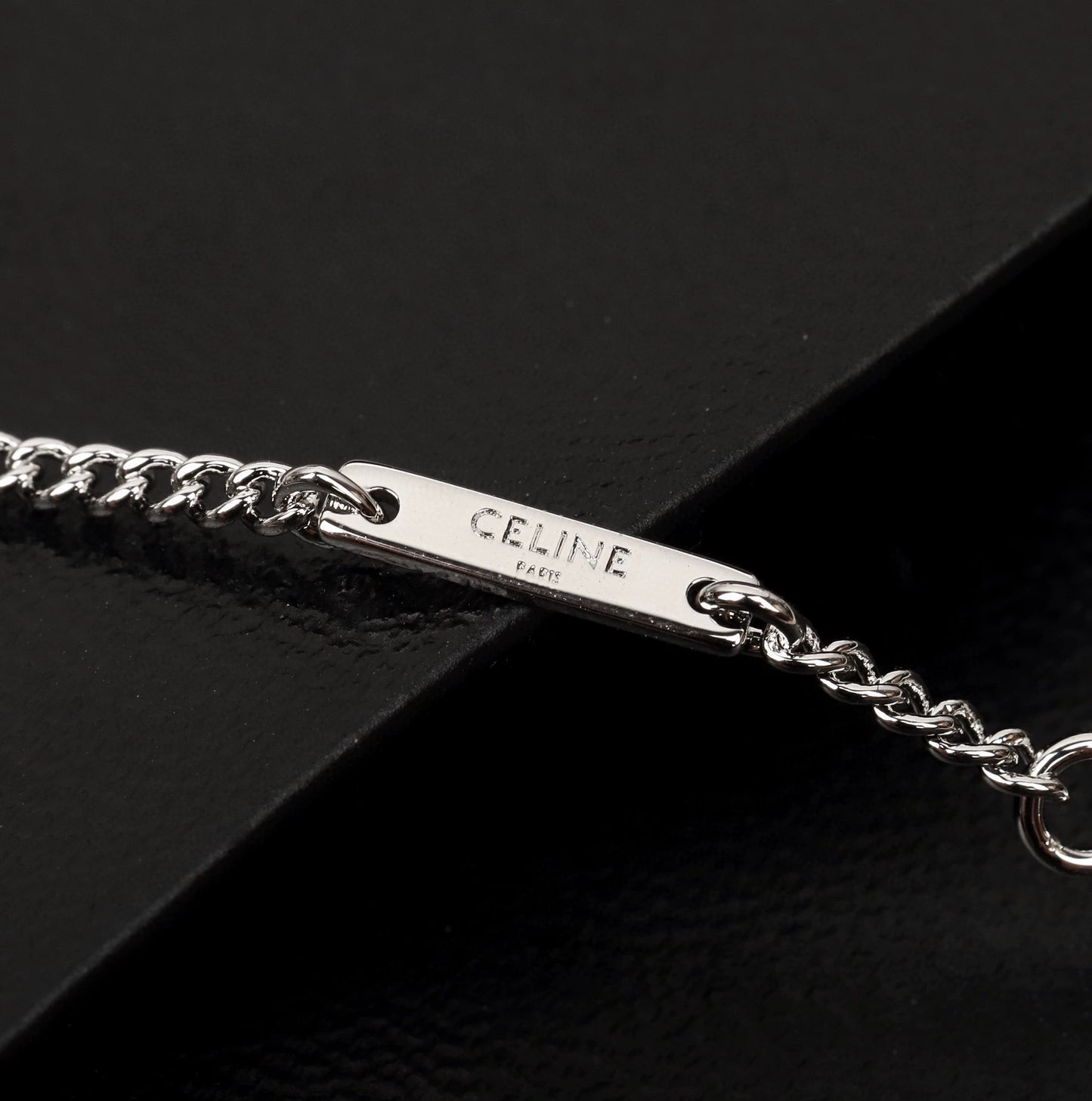 CE 25 Gold necklace with full diamond logo and Arc de Triomphe logo