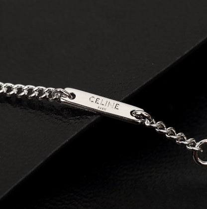 CE 25 Gold necklace with full diamond logo and Arc de Triomphe logo