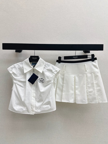 P 25 New Pleated bud sleeve blouse + pleated half skirt set