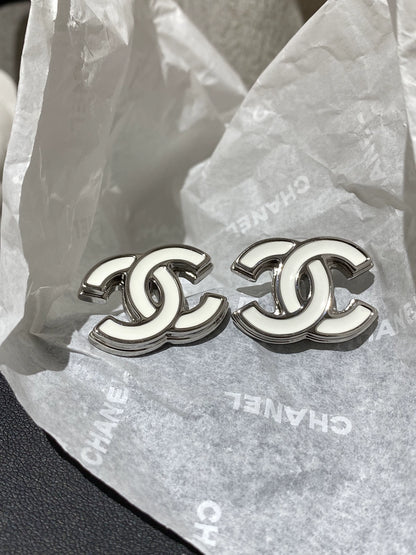 C 25 White enamel earrings