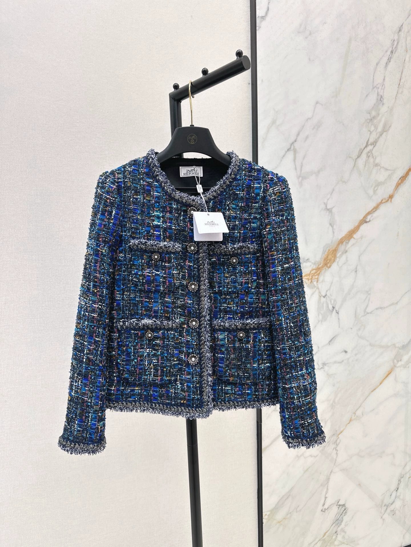 He 25 Tweed jacket with trim