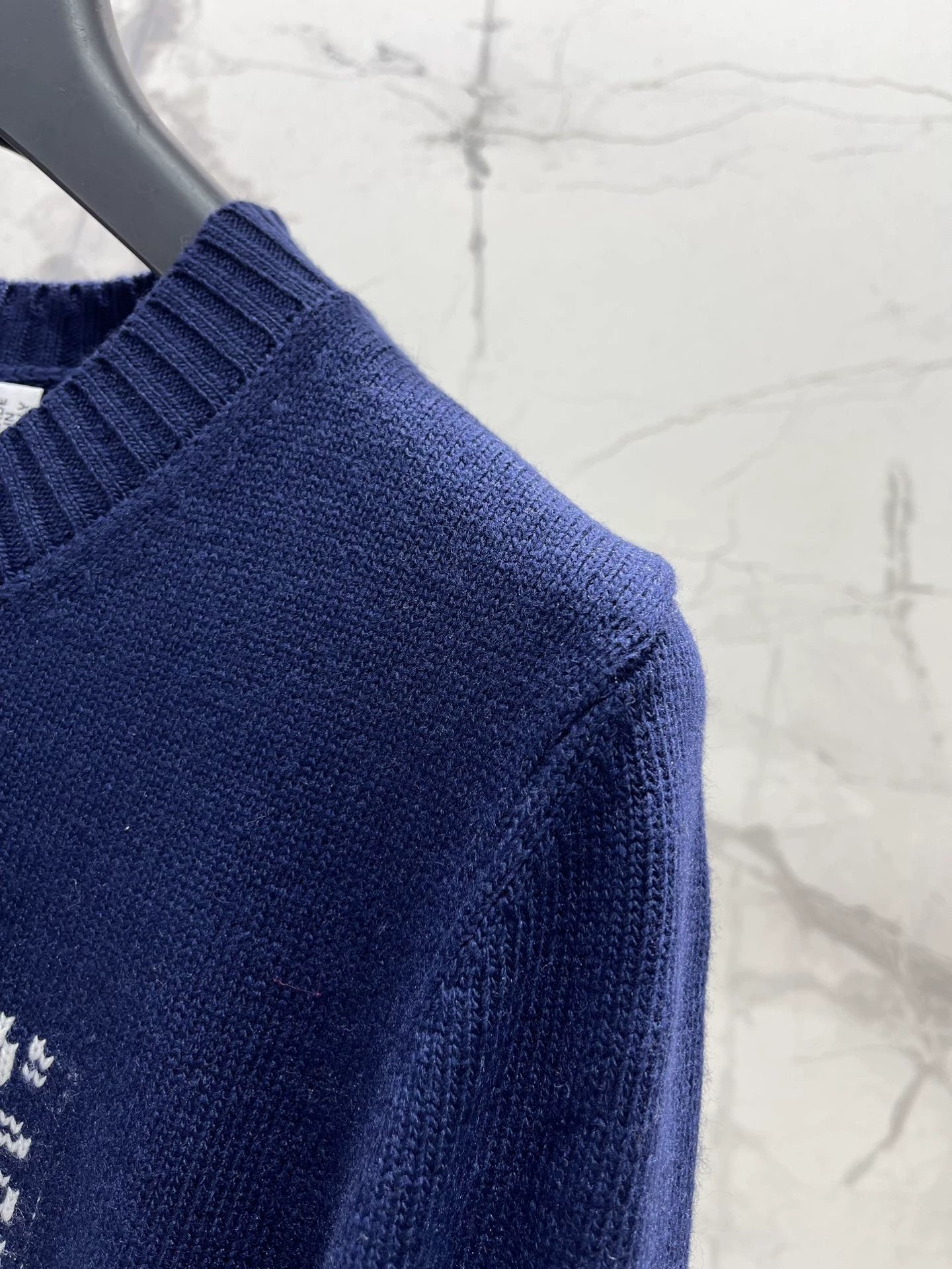 D 25 New letter-print cashmere and wool sweater.