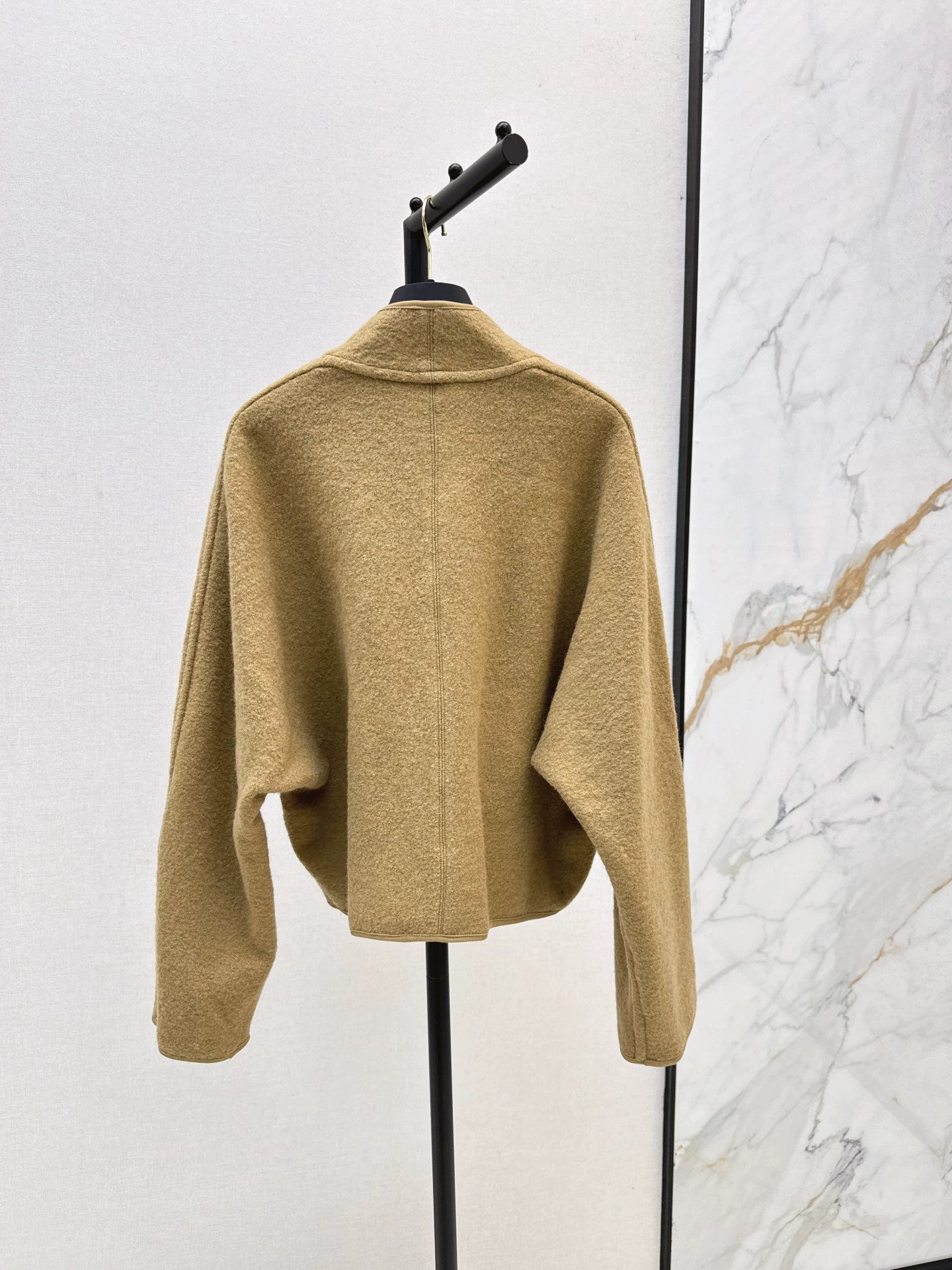 L 25 Buckled double-sided cape coat