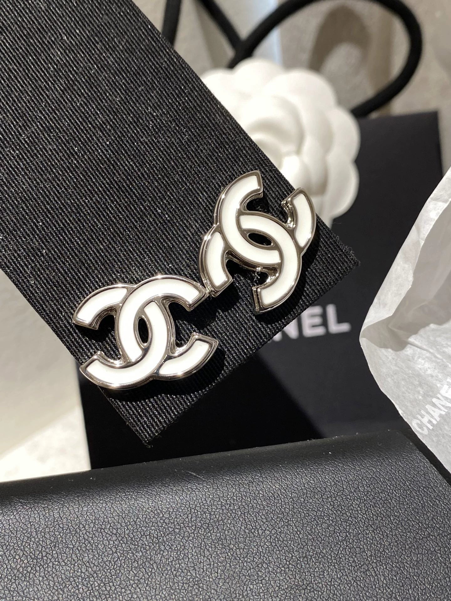 C 25 White enamel earrings