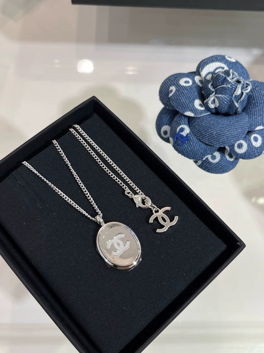 C 25 White Enamel Double C Mirrored Oval Button Necklace