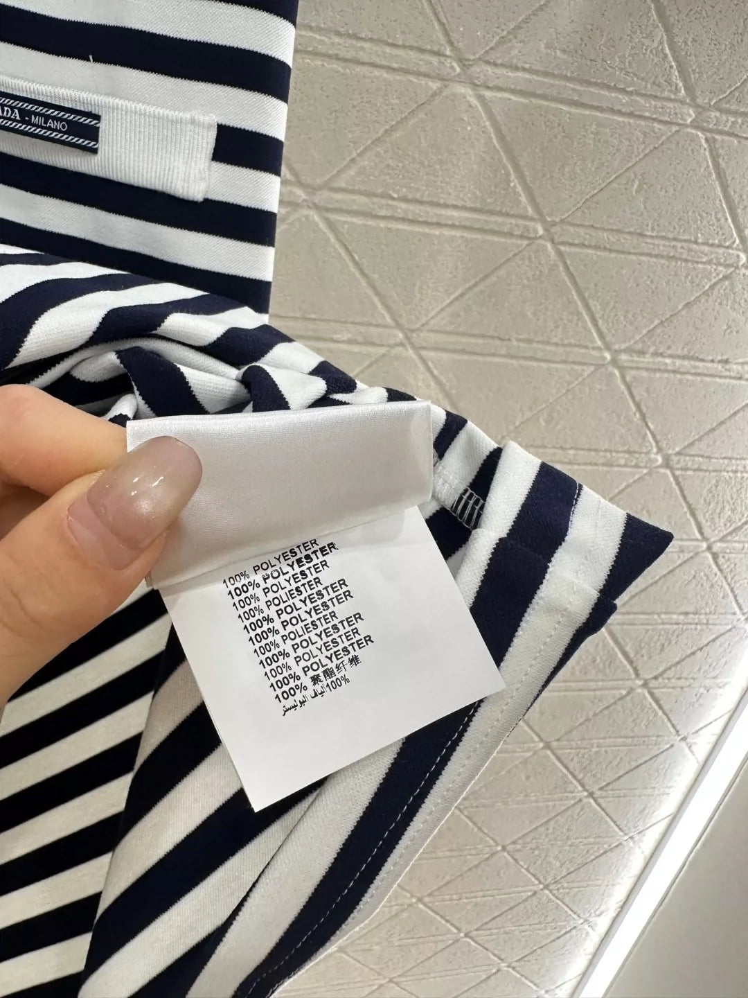 p Spring/Summer 25 Striped short-sleeved dress.