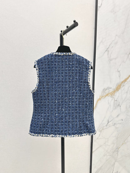 C 25 Model's sapphire blue tweed vest