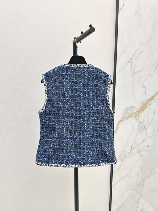 C 25 Model's sapphire blue tweed vest
