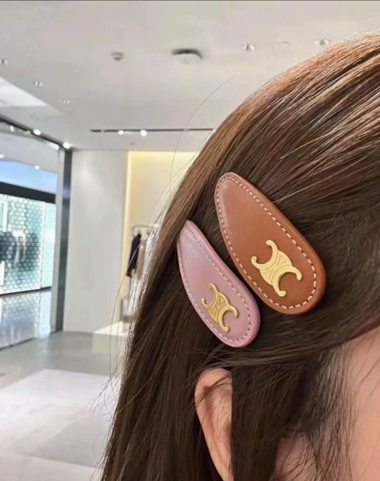 CE 25 Calf leather hair clip