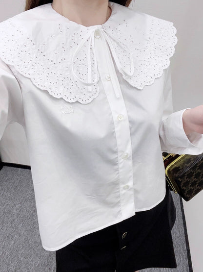 CE 25 Embroidered, hollowed-out shawl collar shirt.