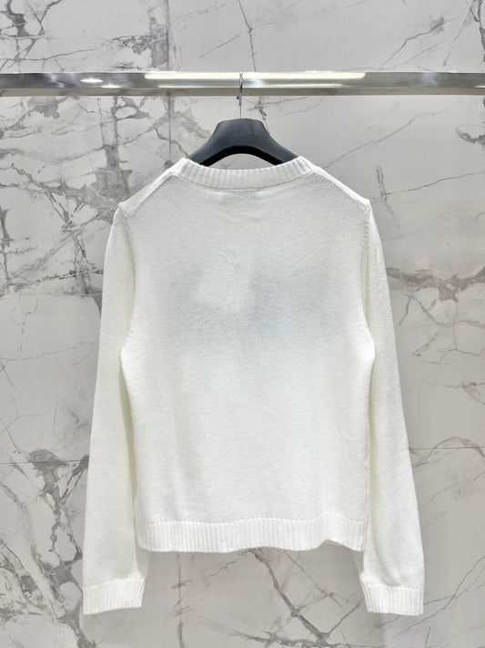D 25 New letter-print cashmere and wool sweater.
