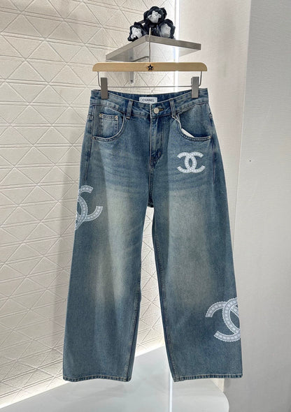C 25 Lace-embroidered denim trousers