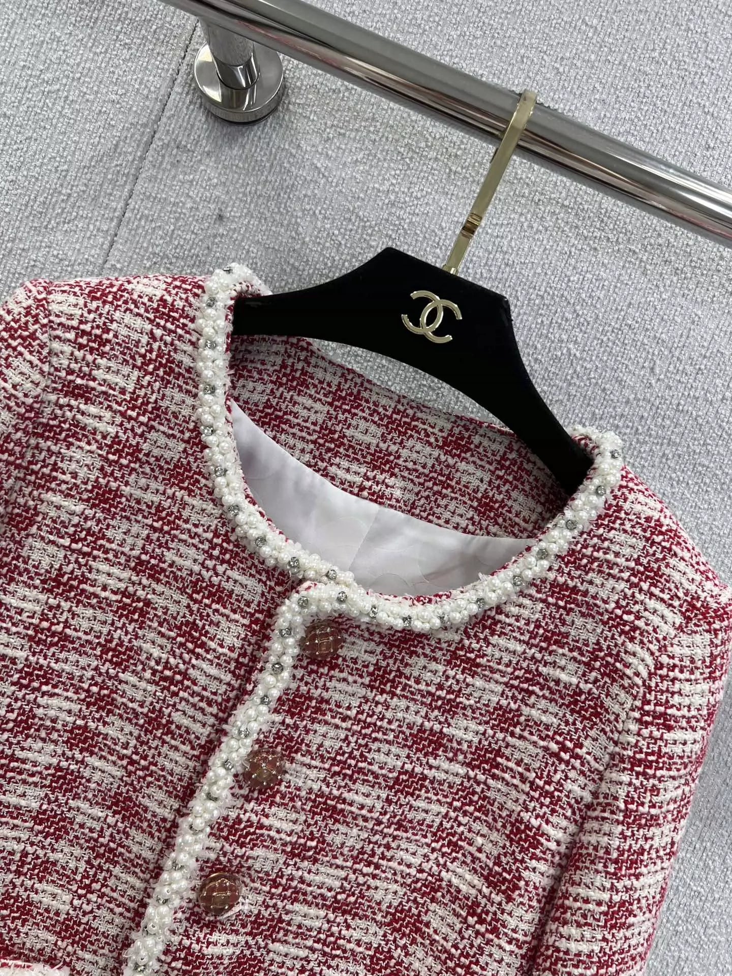 C 25 Red and white checked tweed jacket with beaded trim