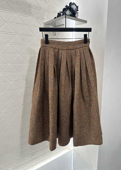 C 25 new styles featuring a lapel dress with beaded hem and skirt set.