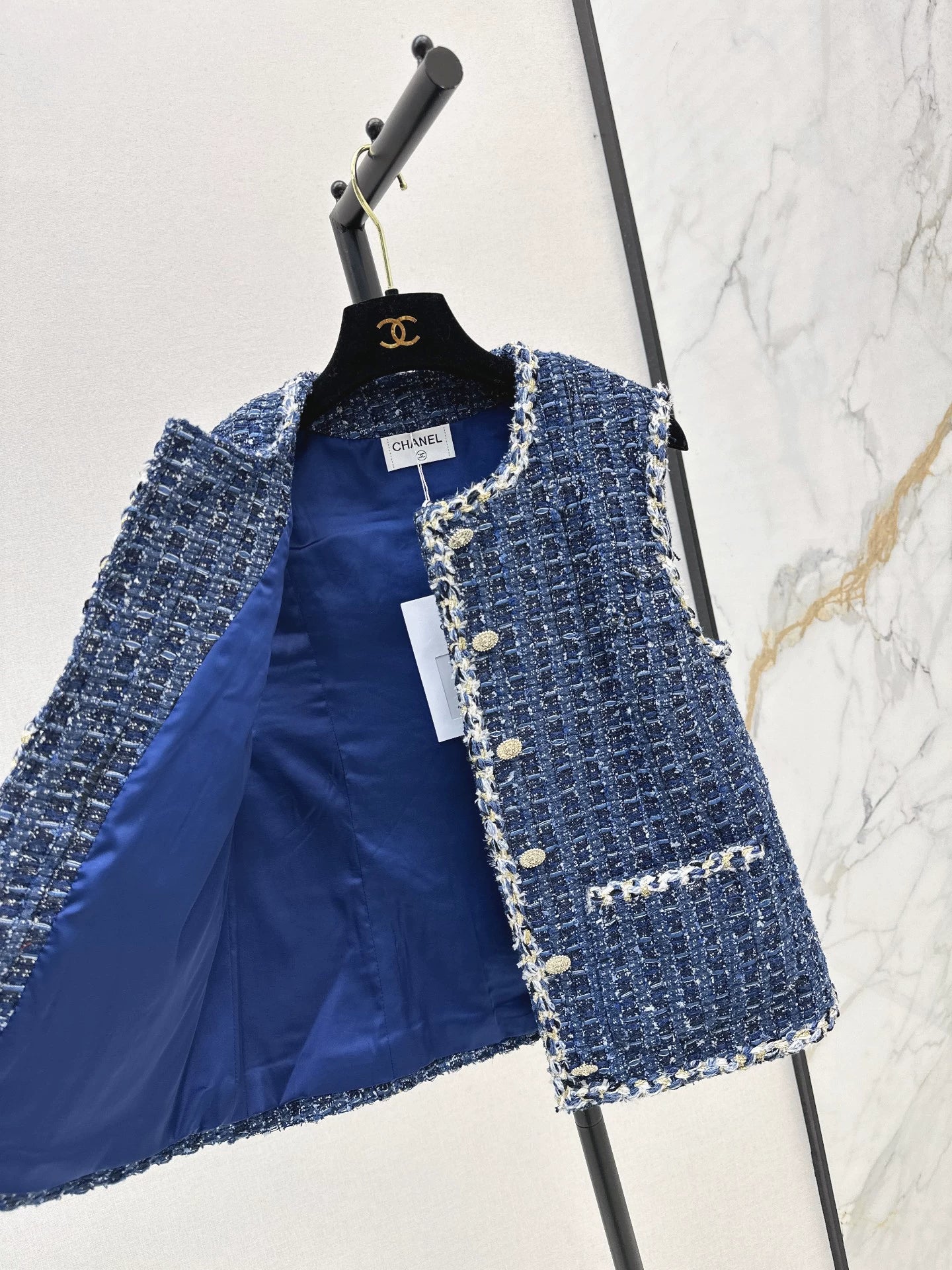 C 25 Model's sapphire blue tweed vest